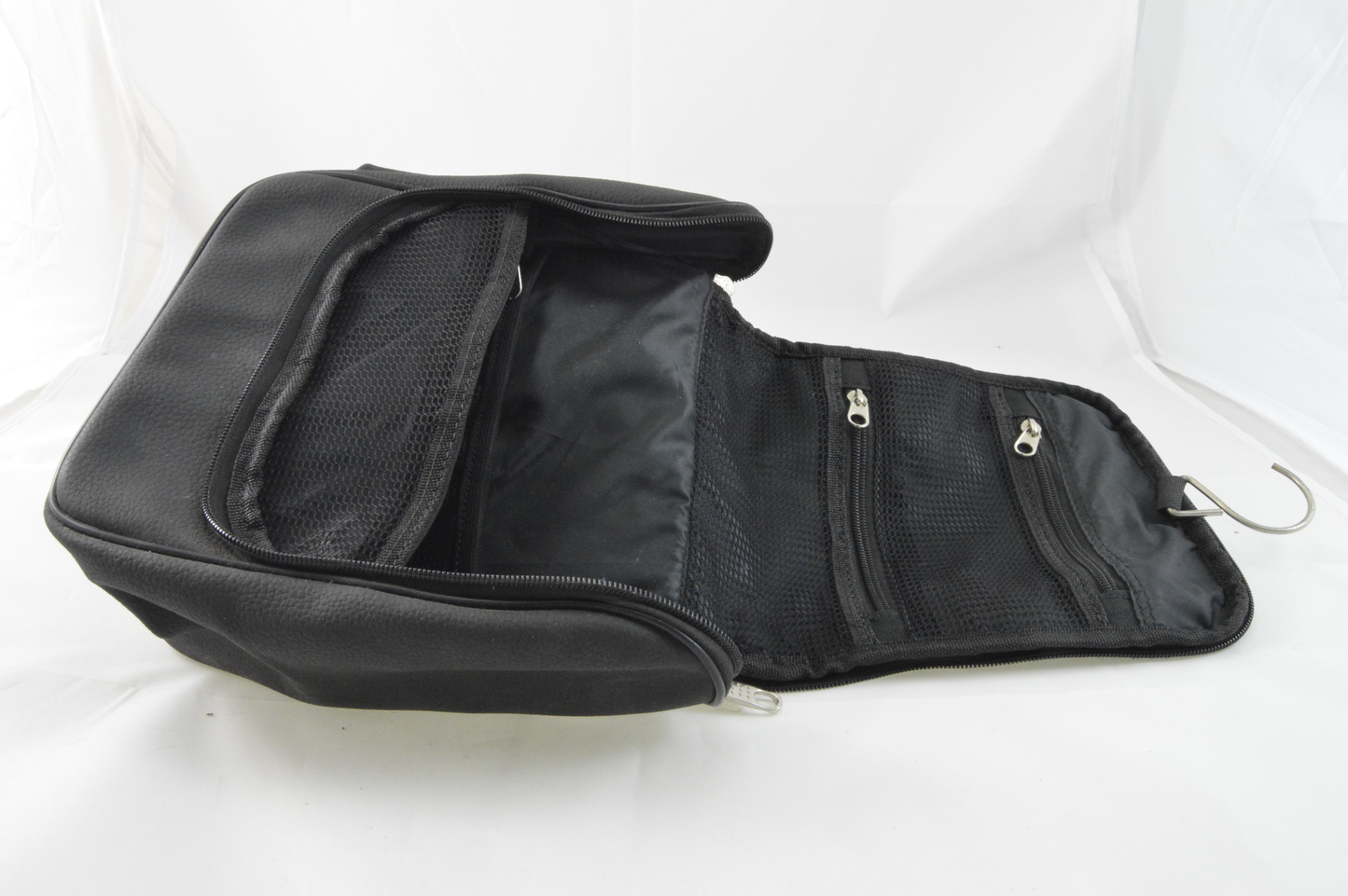 Hanging toiletry bag made of matt black leather